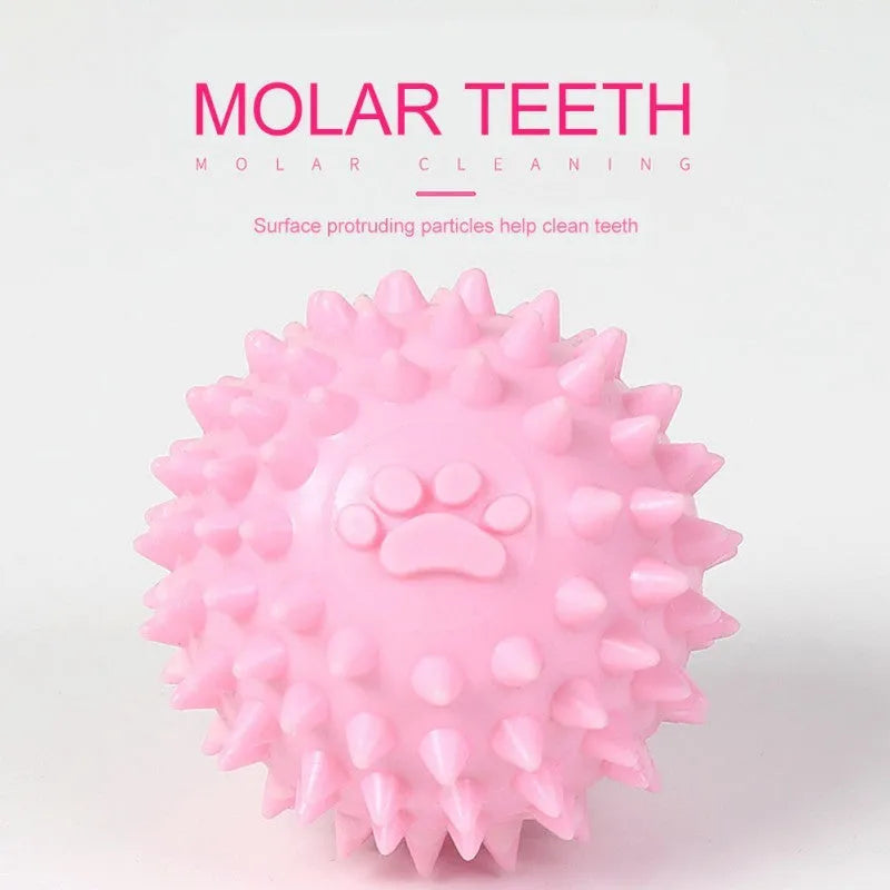 Blue TPR dog chew ball with textured footprint pattern and tooth cleaning nubs