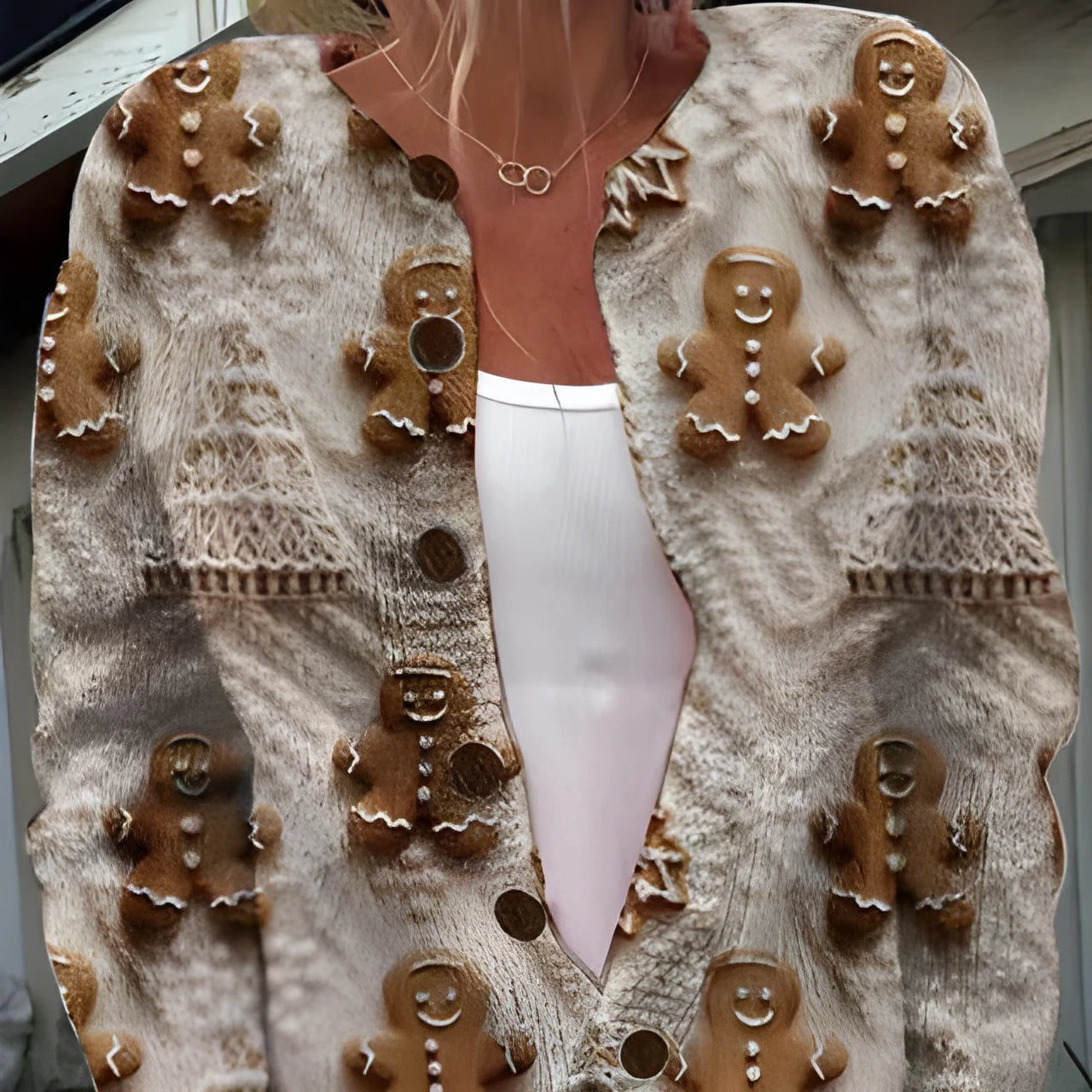 Loose fit women's printed blouse with a lapel collar, shown in a single colour.