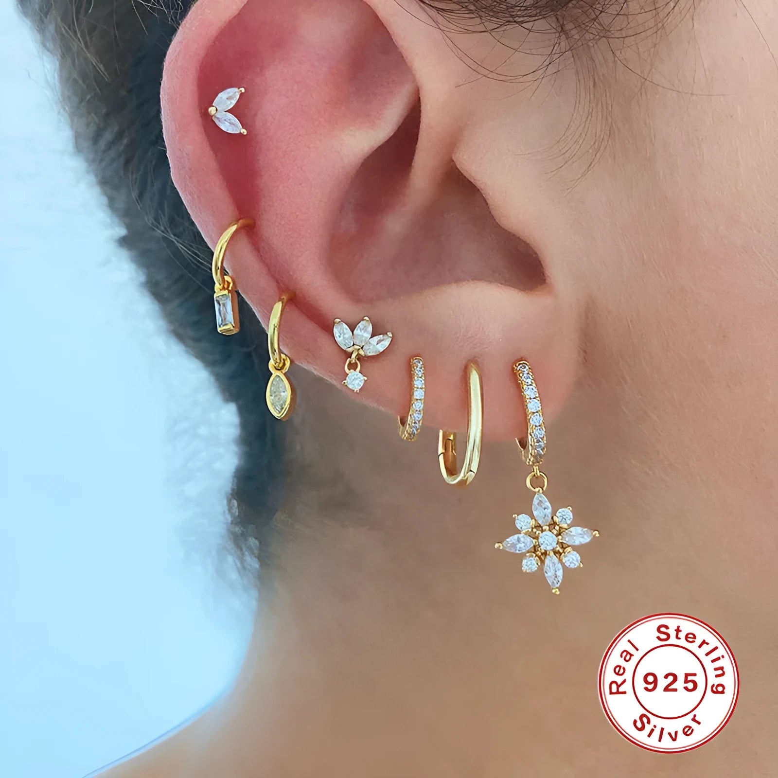 Sterling silver snowflake pendant earrings with diamond accents in geometric design