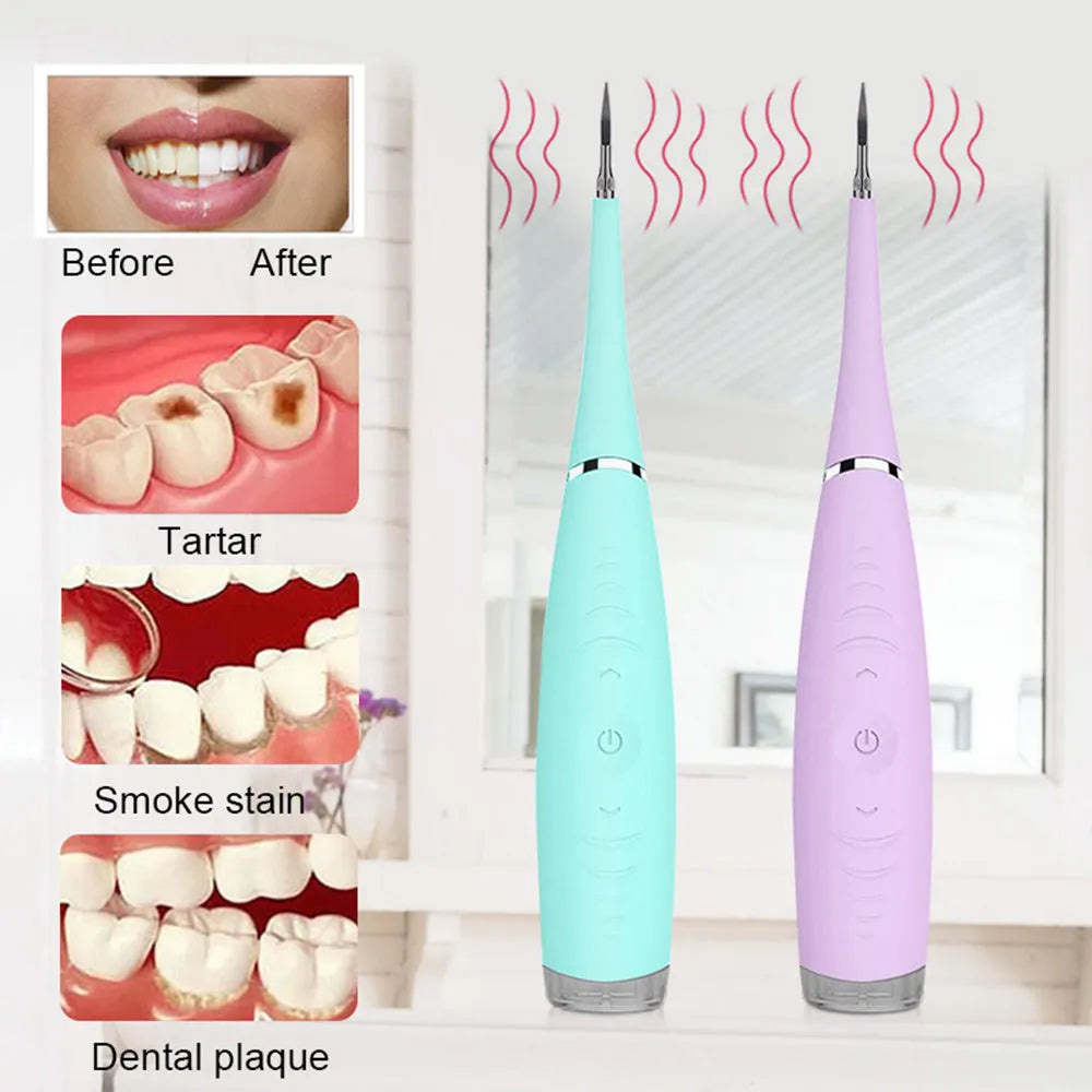 Pink and blue electric dental scaler tool with silicone handle on a bathroom counter.