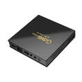 Q96 MAX S905 Android 4K TV set-top box with remote control and HDMI cable on a dark surface.