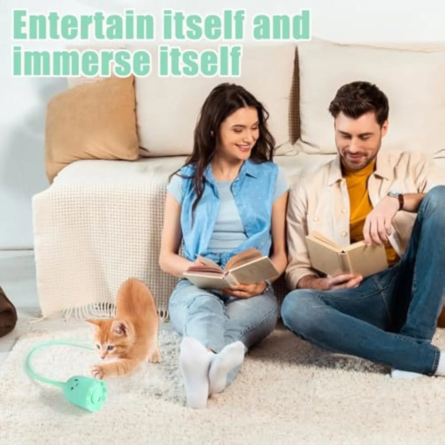 Green rechargeable automatic electronic cat wand toy with swinging silicone tail on a wooden floor