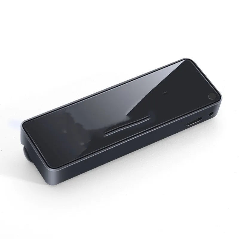 Black car air vent perfume diffuser with LED light attached to dashboard vent