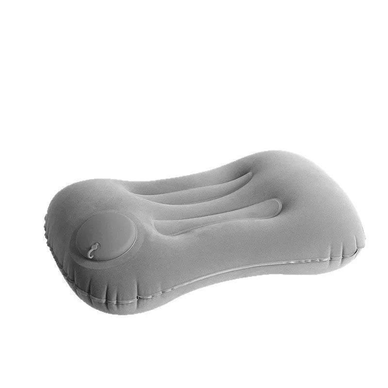 Grey inflatable travel pillow with flocking surface, shown inflated to 45x30x13cm size.