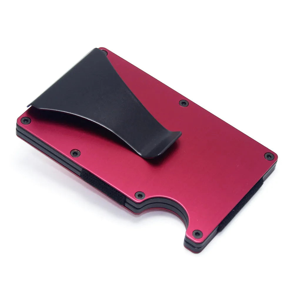 Slim black carbon fibre card holder wallet with geometric design on a gift box.