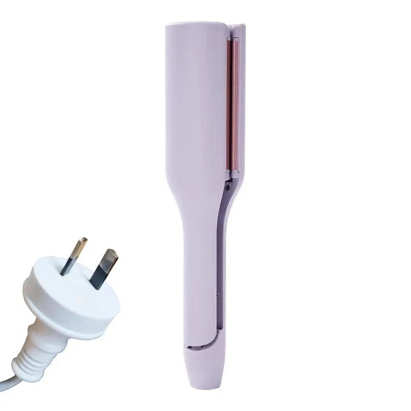 32mm pink hair curling iron with ceramic barrel and 4 heat settings on white background