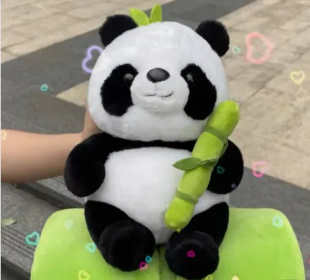 Panda plush doll holding bamboo shoots in bamboo tube design with PP cotton filling