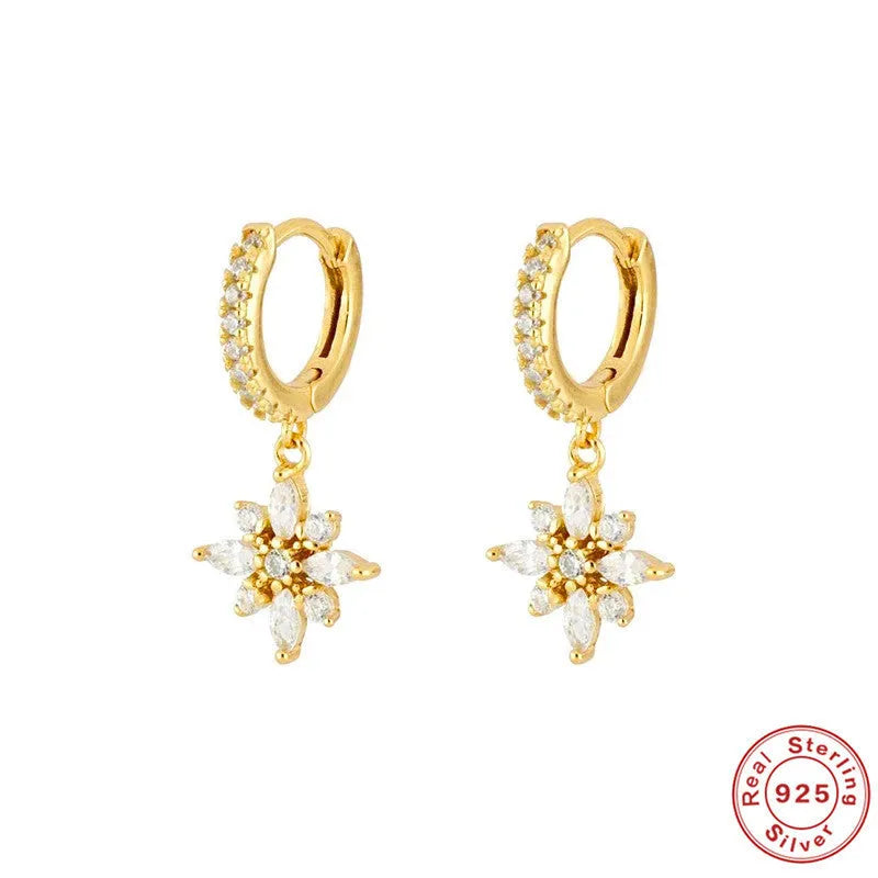 Sterling silver snowflake pendant earrings with diamond accents in geometric design