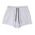 Men's black and white quick-drying nylon shorts for summer sports and leisure.