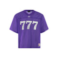 Retro loose fit short sleeve t-shirt in purple on a hanger.