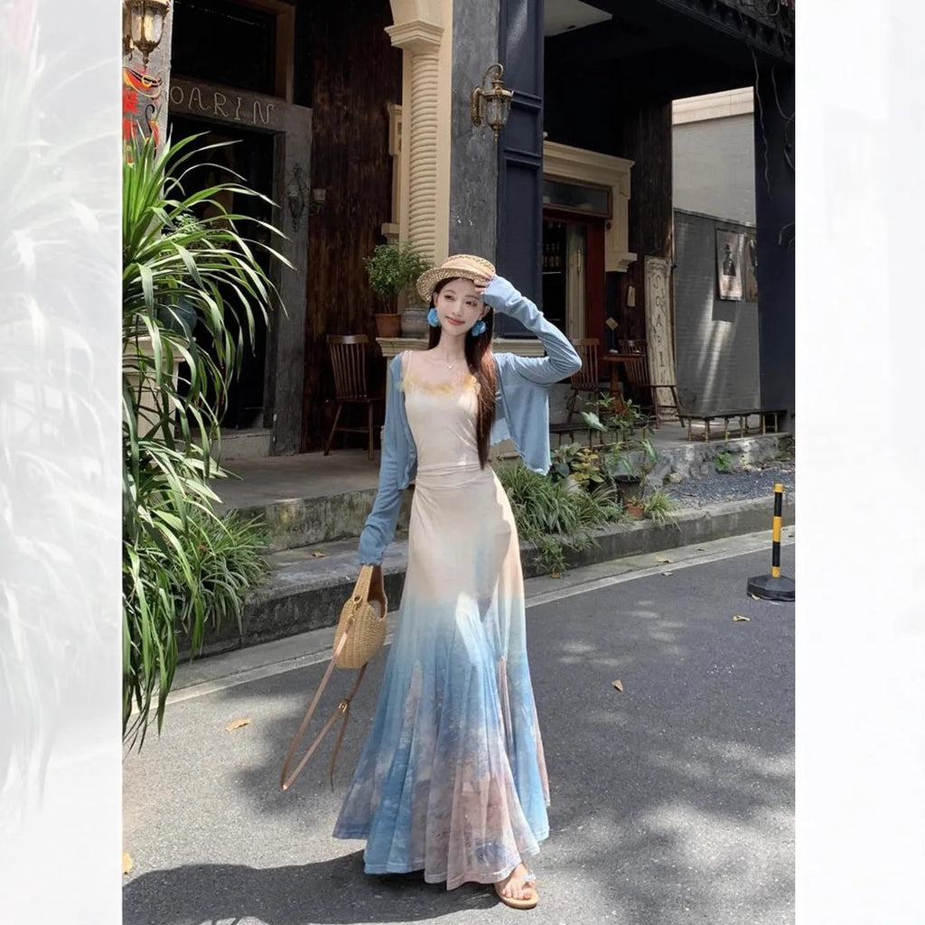 High waist fishtail midi dress with sleeveless cut, princess sleeves, and suspender dress styling in spandex, sizes S M L.