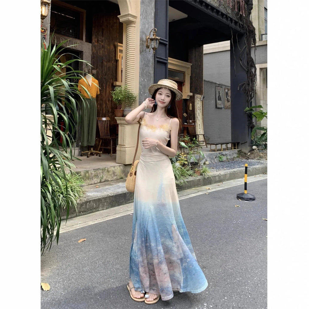 High waist fishtail midi dress with sleeveless cut, princess sleeves, and suspender dress styling in spandex, sizes S M L.