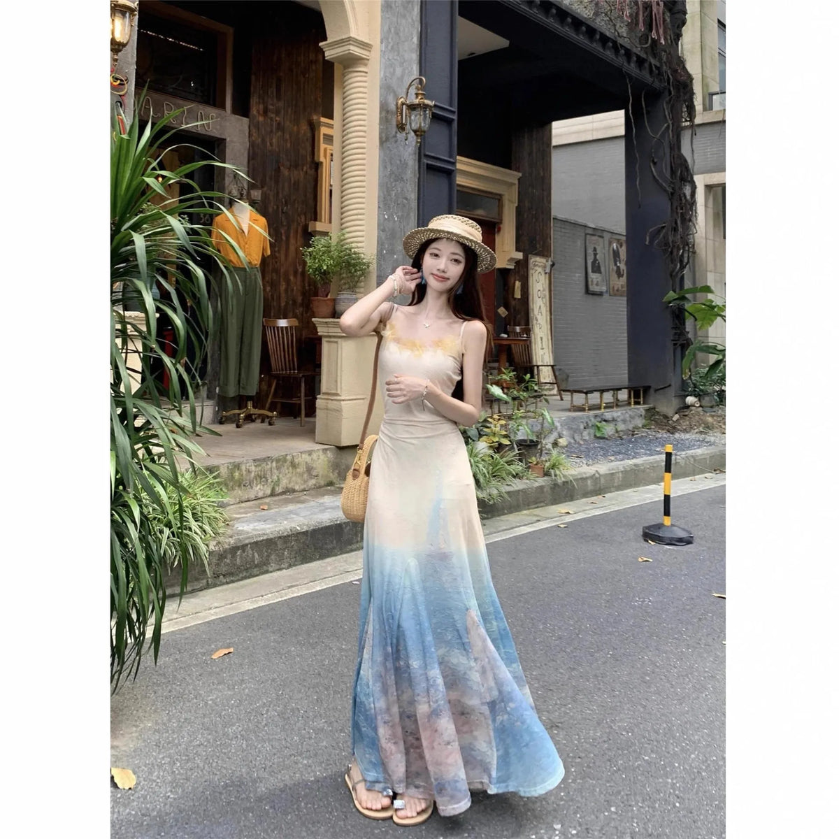 High waist fishtail midi dress with sleeveless cut, princess sleeves, and suspender dress styling in spandex, sizes S M L.