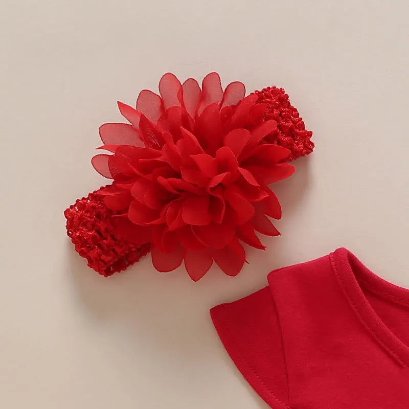 Korean-style red cotton pleated baby dress with matching shoes and large red flower hairband for a baby girl.