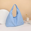 Heart-shaped nylon underarm bag for women in black, blue, khaki, or yellow with large capacity storage
