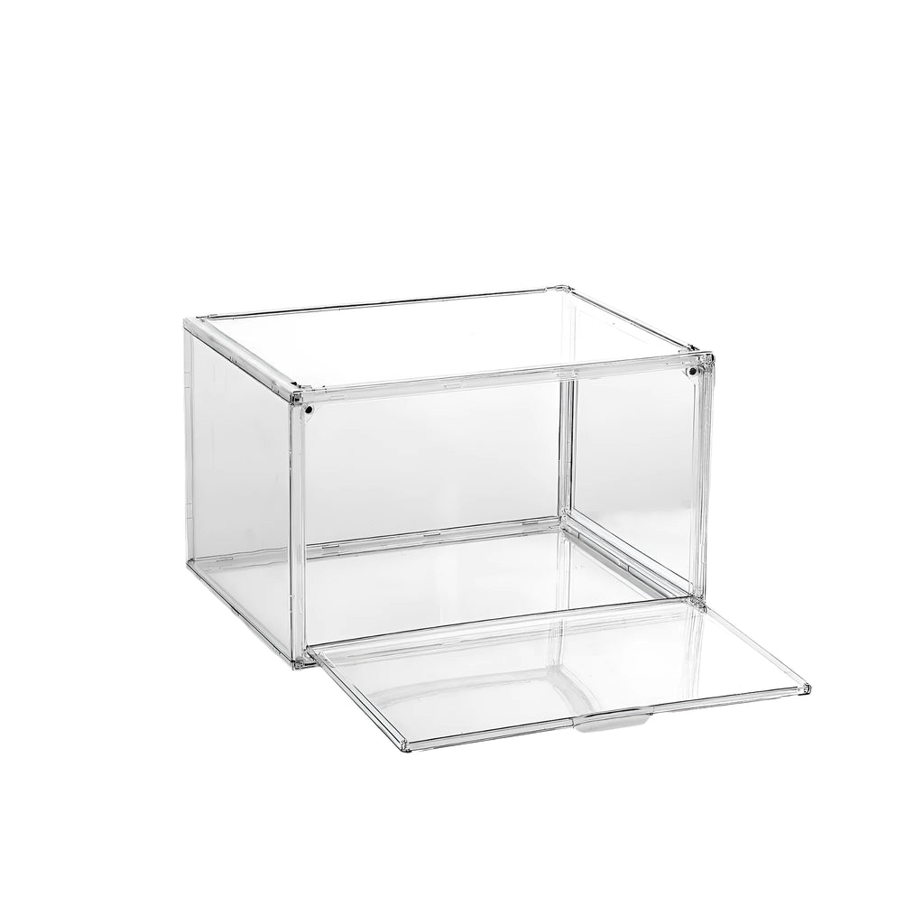 Clear acrylic shoe storage box with magnetic side door open, showing shoes inside.