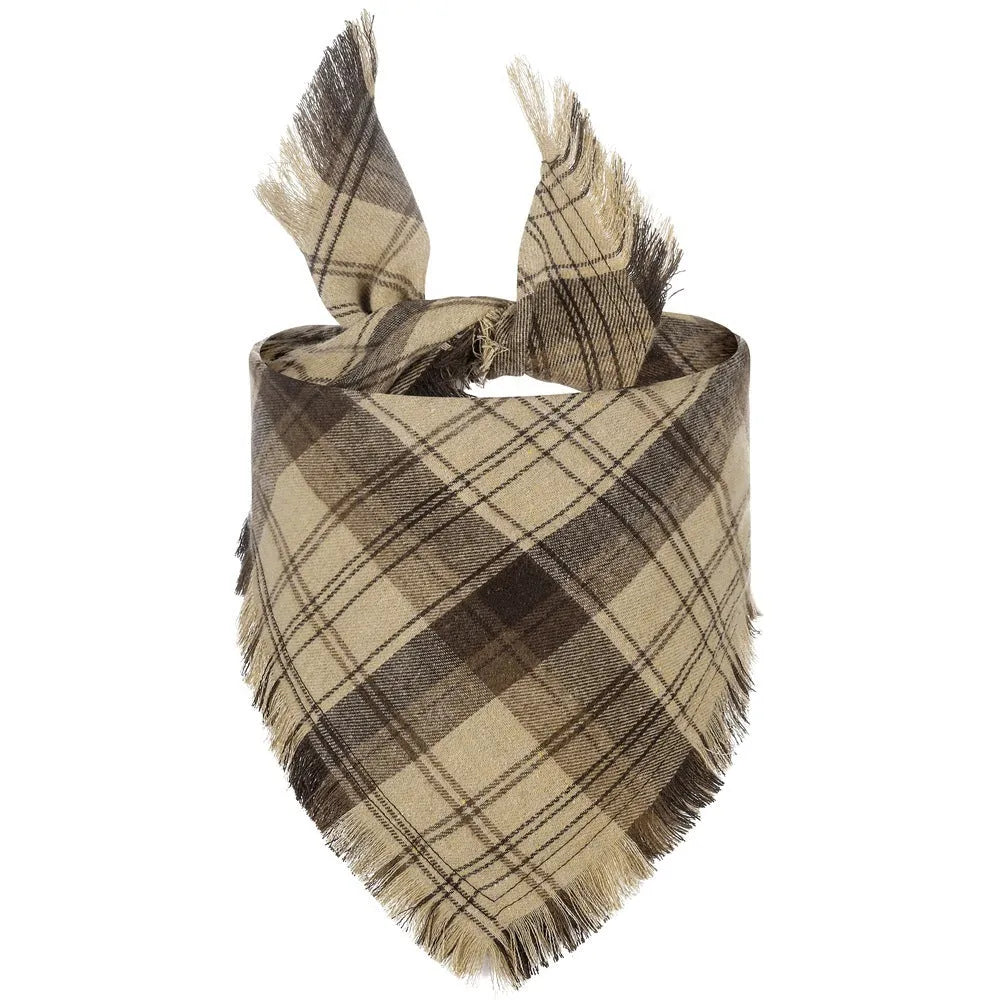 Classic plaid dog bandana with tasselled edges in autumn colours tied around dog's neck