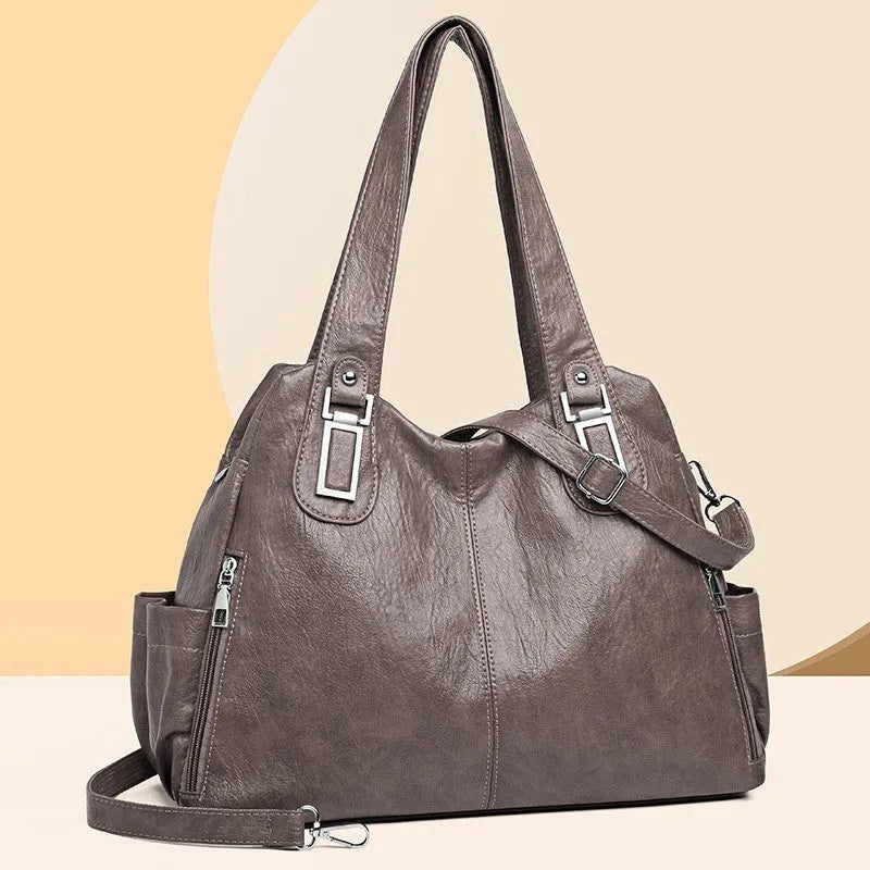 Large square vertical PU tote bag for women in light brown colour, showing single strap and clean design.