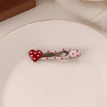 Red love heart-shaped hair barrette with 3D design, retro dots, and willow leaf decoration.