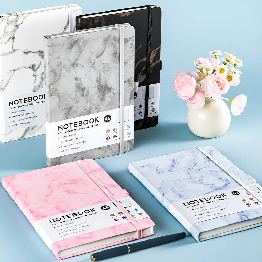 A5 diary with soft PU leather cover in a skin feeling texture, open to show horizontal line pages.