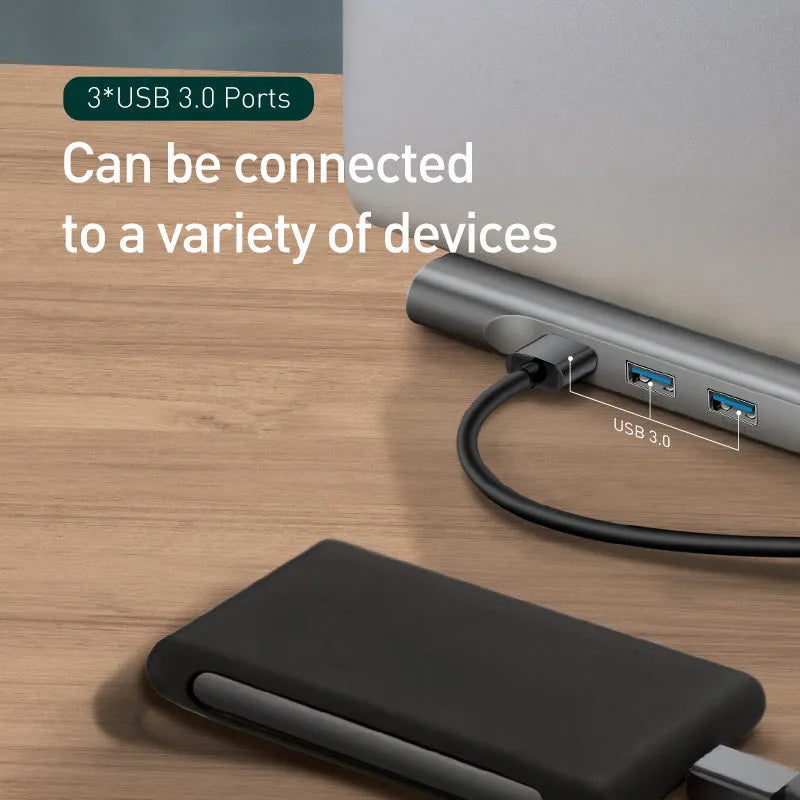 Ten-port aluminium docking station with cooling bracket showing HDMI, VGA, and Ethernet ports