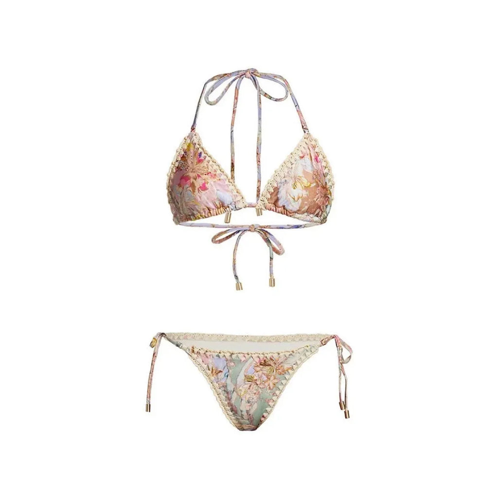 Creamy white floral print women's bikini set with attached skirt, showing top, briefs, and skirt components