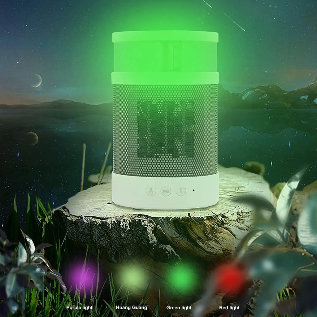 White 3 in 1 portable space heater with 400ml humidifier and colourful night light on a desk