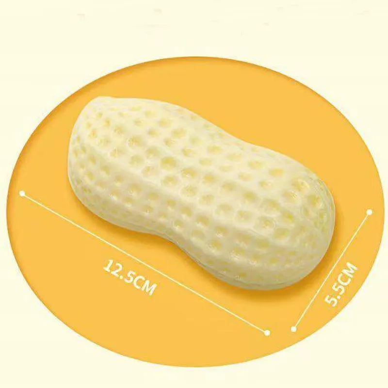 Yellow peanut-shaped dog chew toy with textured surface for dental cleaning