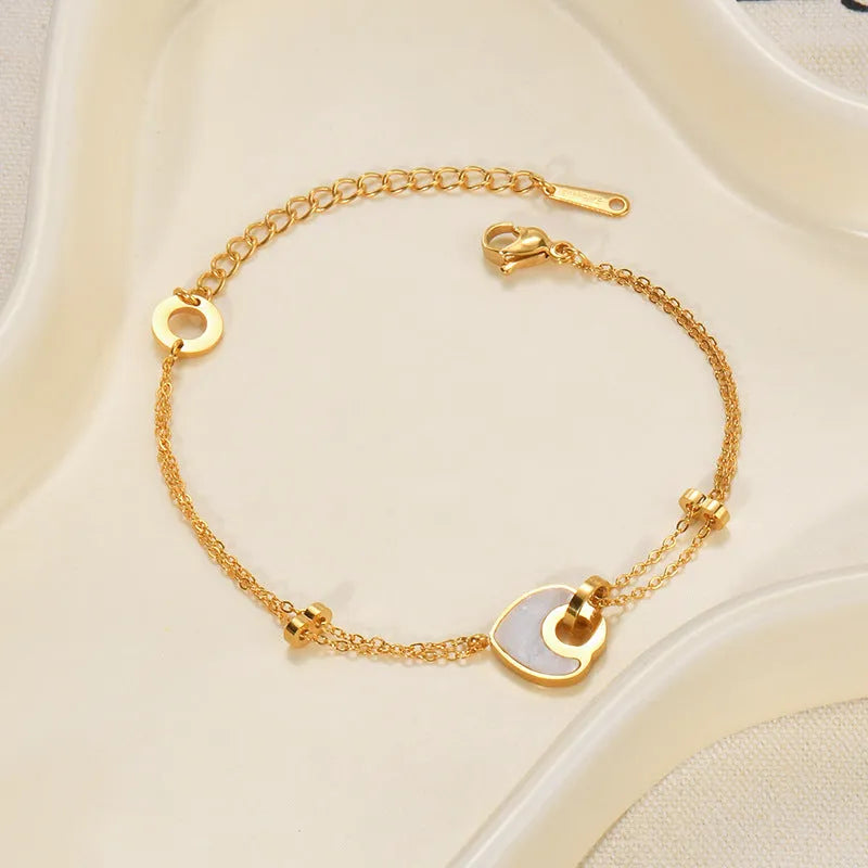 Women's stainless steel resin bracelet with double-layer loving heart design and heart-shaped pendant