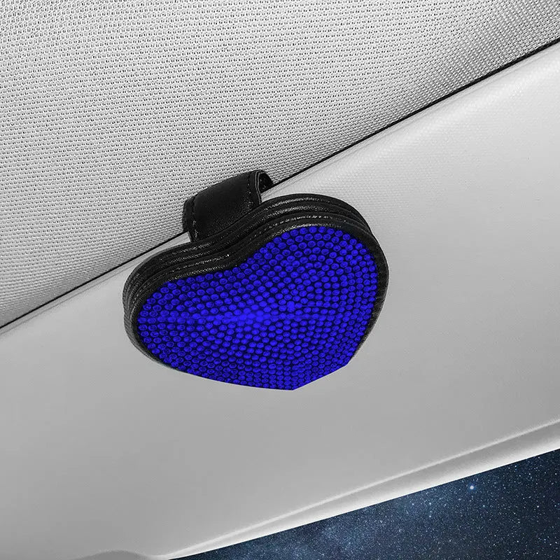 Black PU leather car sun visor clip with diamond accents holding sunglasses and a ticket.