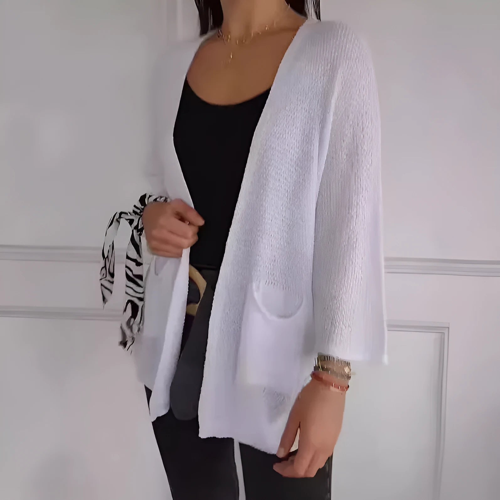 Women's waffle knit cardigan coat in apricot colour with nine-quarter sleeves and side pockets
