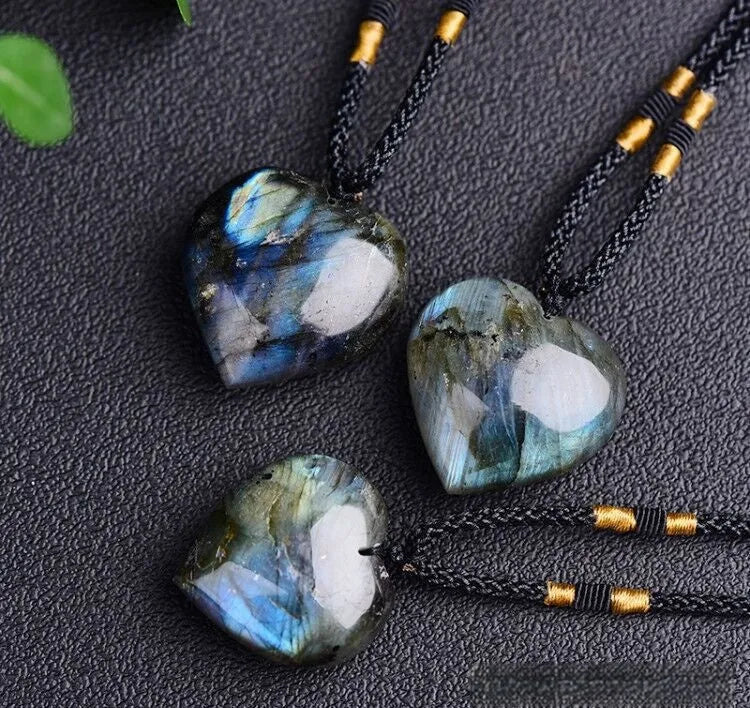 Blue natural Labradorite and Moonstone geometric heart of the ocean pendant necklace on a chain.