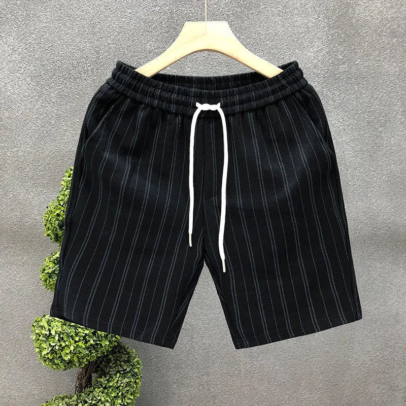 Men's black and white striped fleece-lined casual shorts with straight leg and ankle banded design
