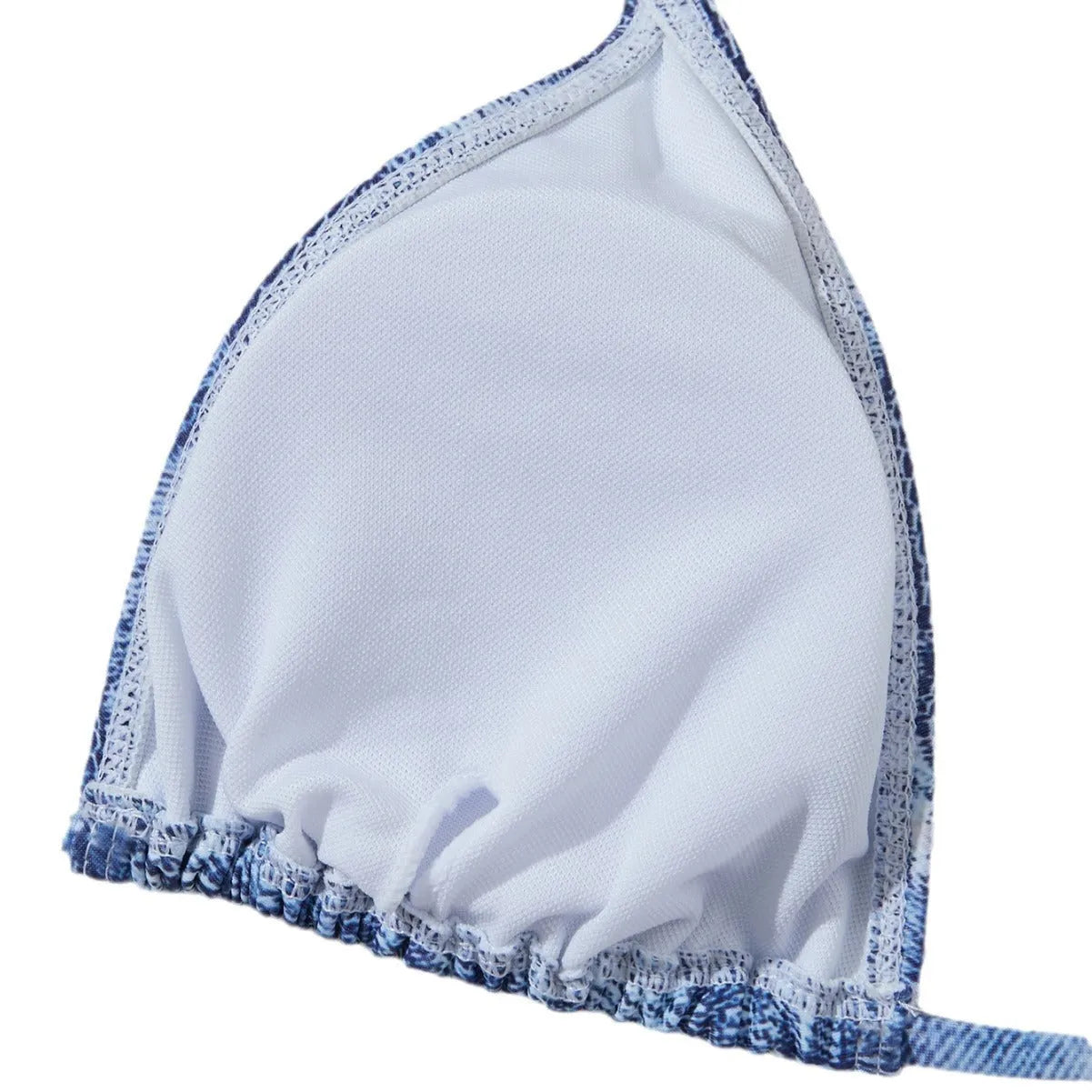 Denim blue printed women's bikini set with strap design on a mannequin, showing top and bottom.