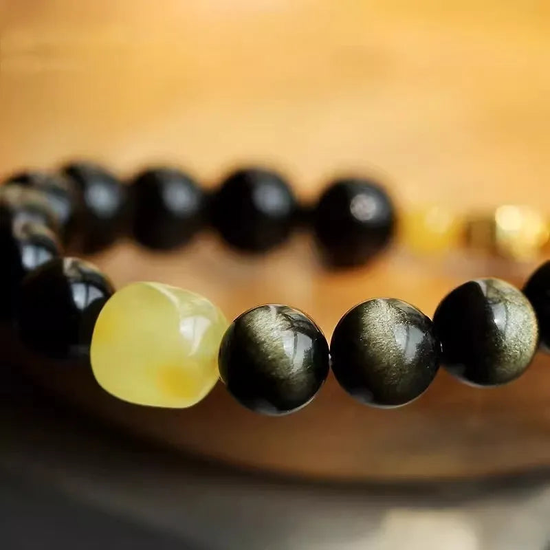 Golden obsidian bracelet with 10mm zodiac animal beads in geometric ethnic design