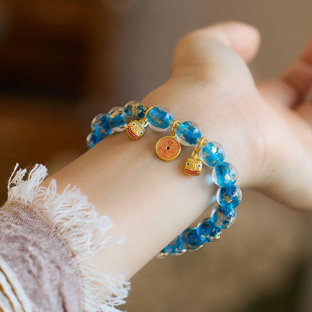 Handmade national style glass coloured glaze swallowing gold beast bracelet in fragrant grey with gold foil accents