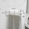 Nordic style folding towel rack in black mounted on bathroom wall without drilling