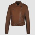 Women's red PU leather motorcycle jacket with lapel collar and a short waist belt.