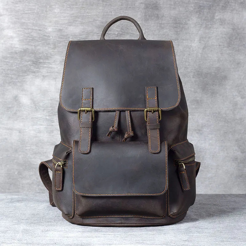 Retro crazy horse leather backpack in brown showing double shoulder straps and soft handle