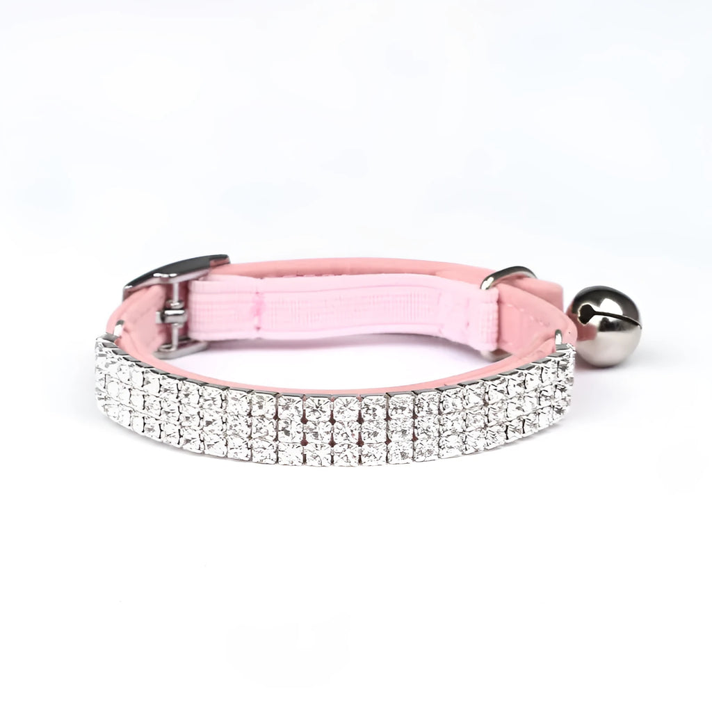 Adjustable velvet cat collar with rhinestones in red, blue, purple, black, and pink colour options.