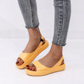 Women's summer fish mouth flat sandals in solid colour with back strap design, side hollow detail, artificial PU upper, rubber sole