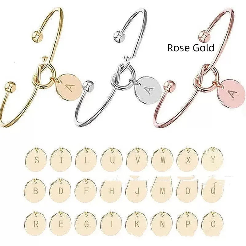Titanium steel DIY love heart bracelet with electroplated finish showing letter wafer option