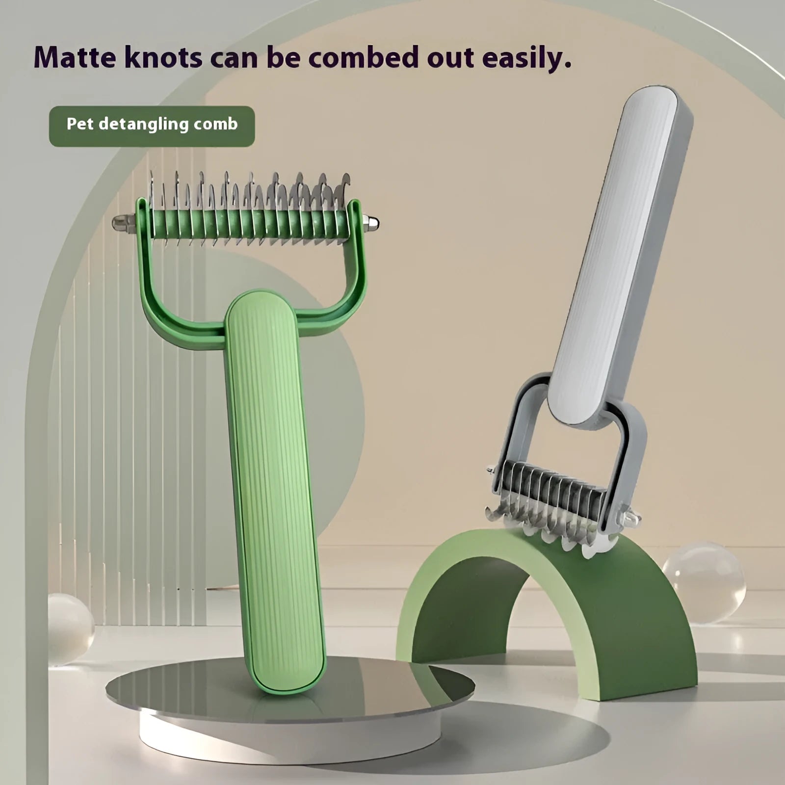 Green and grey dog detangling combs with stainless steel teeth, shown in large and small sizes.