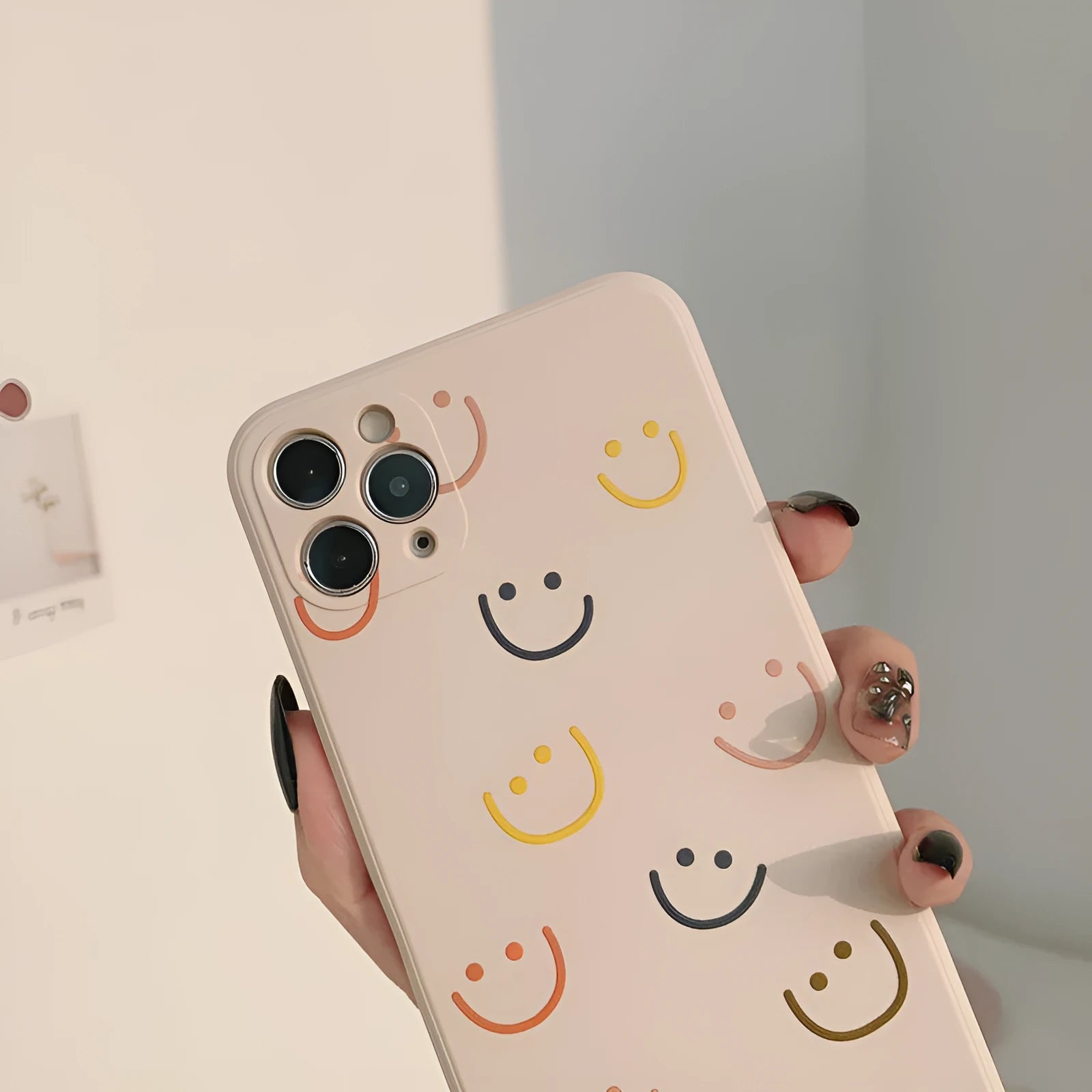 Silicone phone case with smiley design for Apple iPhone models in TPU material