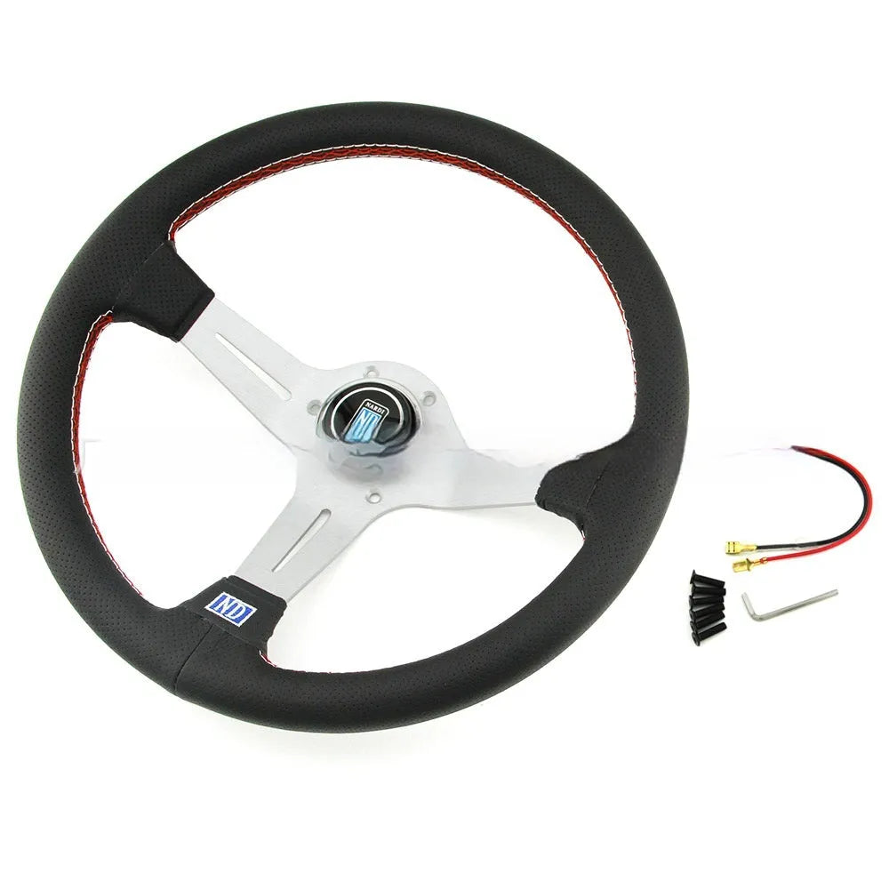 14-inch leather steering wheel with concave centre in black skeleton finish.