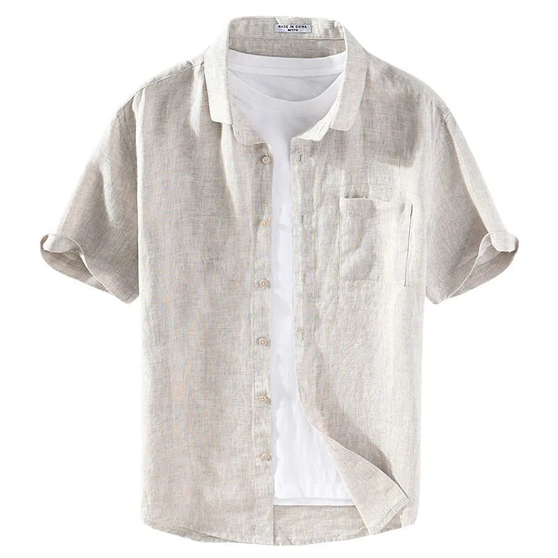 Men's short sleeve linen shirt with a square collar in raw jute colour on a hanger.