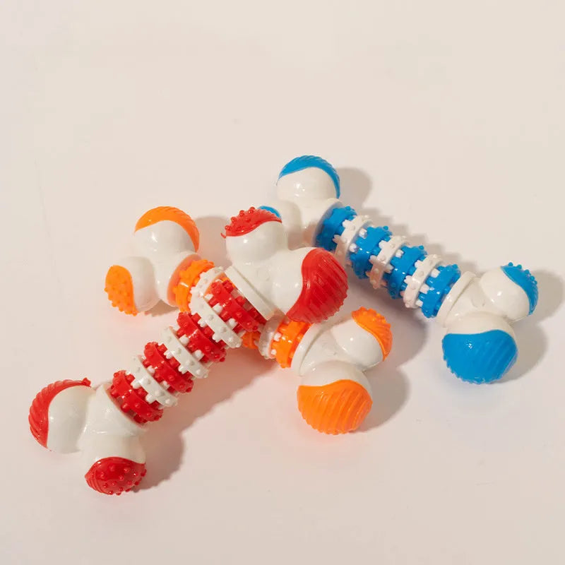 Small breed dog bone toy with treat holder in blue, orange, and red colours