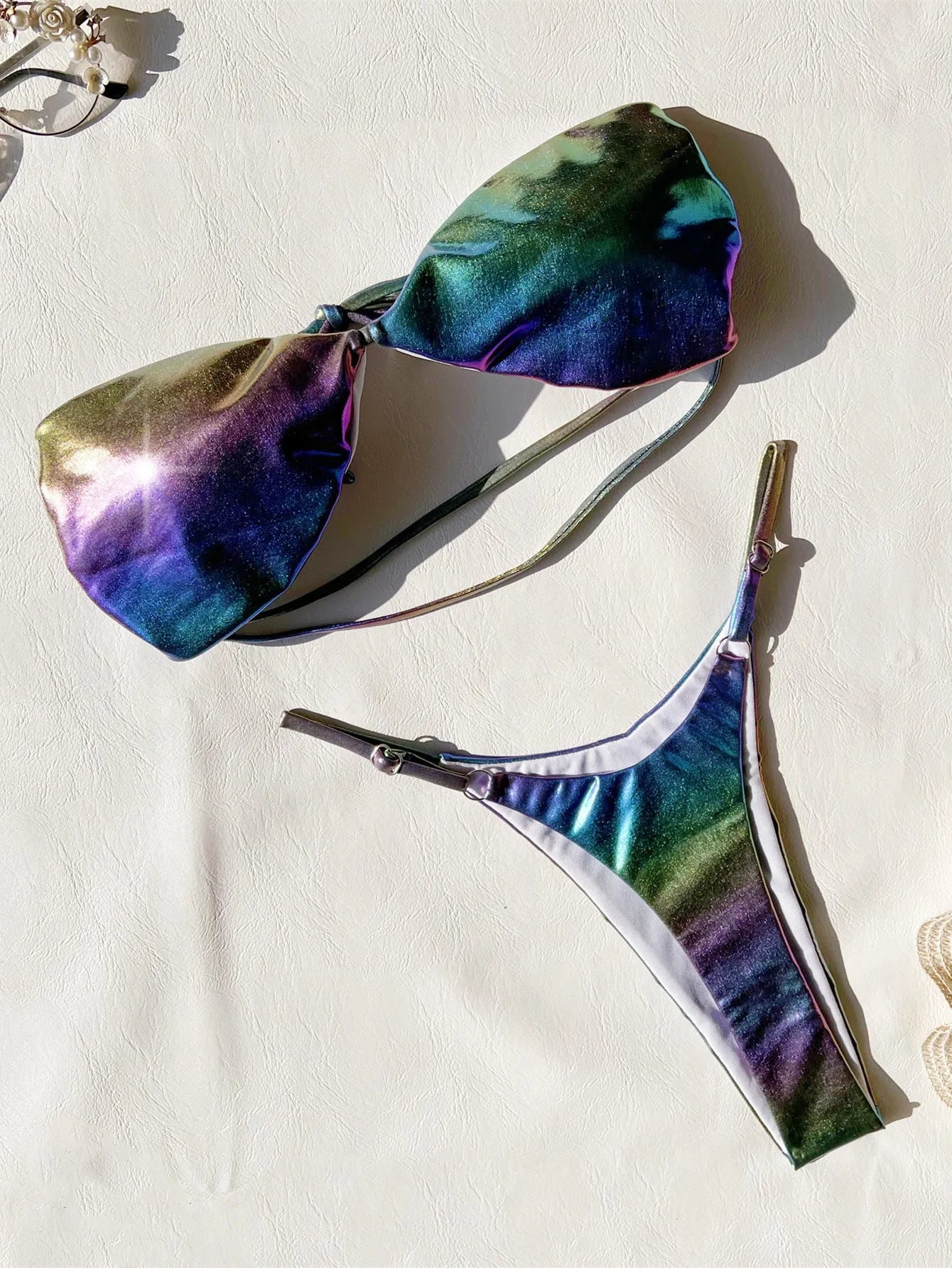 Women's gradient purple bikini swimsuit set on a white background