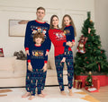 Matching family wearing red plaid Christmas deer print cotton pyjamas, including adults, children, and a dog.