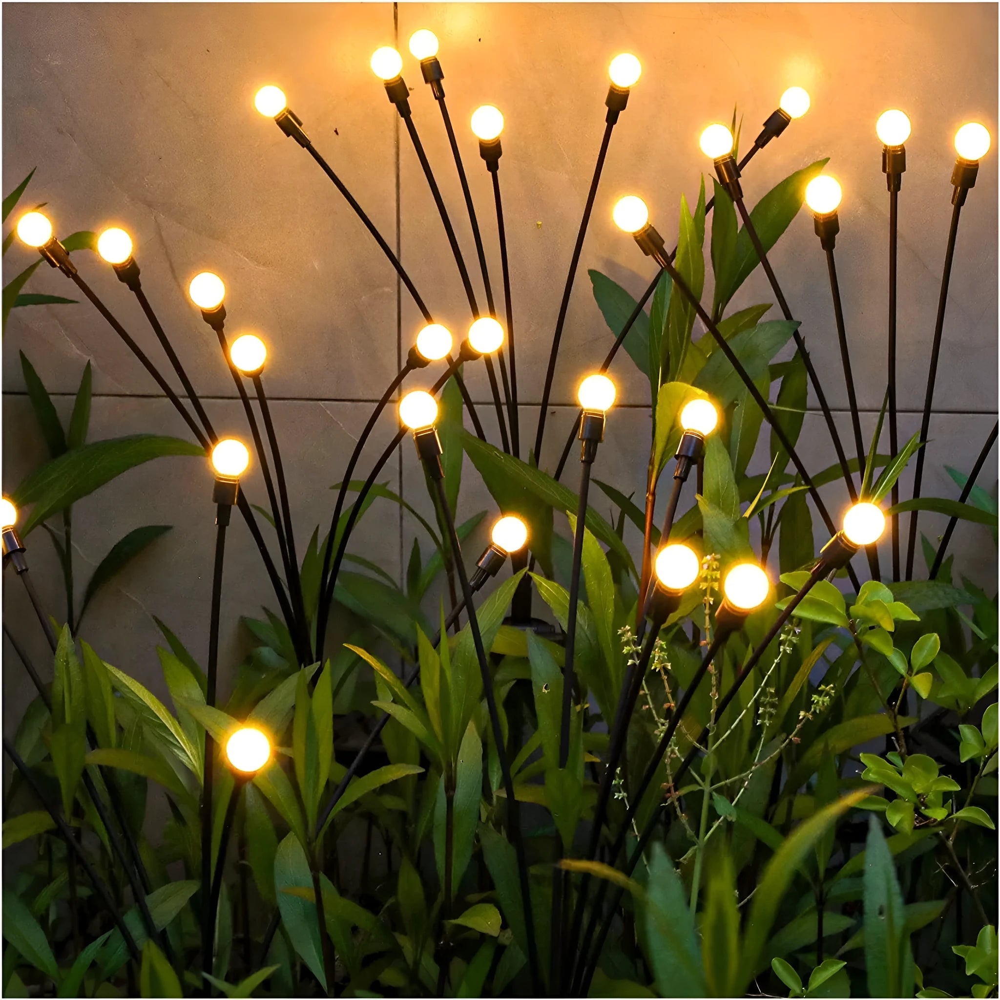 Solar-powered LED garden stake light with multiple heads on a stainless steel spike, showing warm white and coloured light modes.
